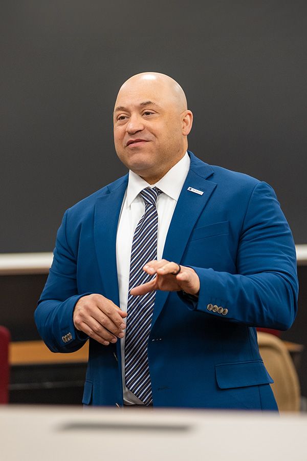 Professor Burton talks to a class