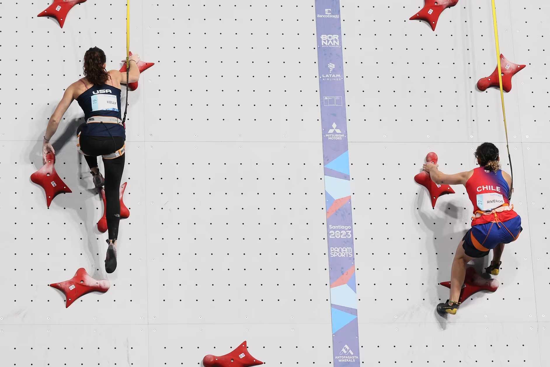 Piper Kelly climbing the wall in Santiago, Chile to qualify for Paris Olympics.