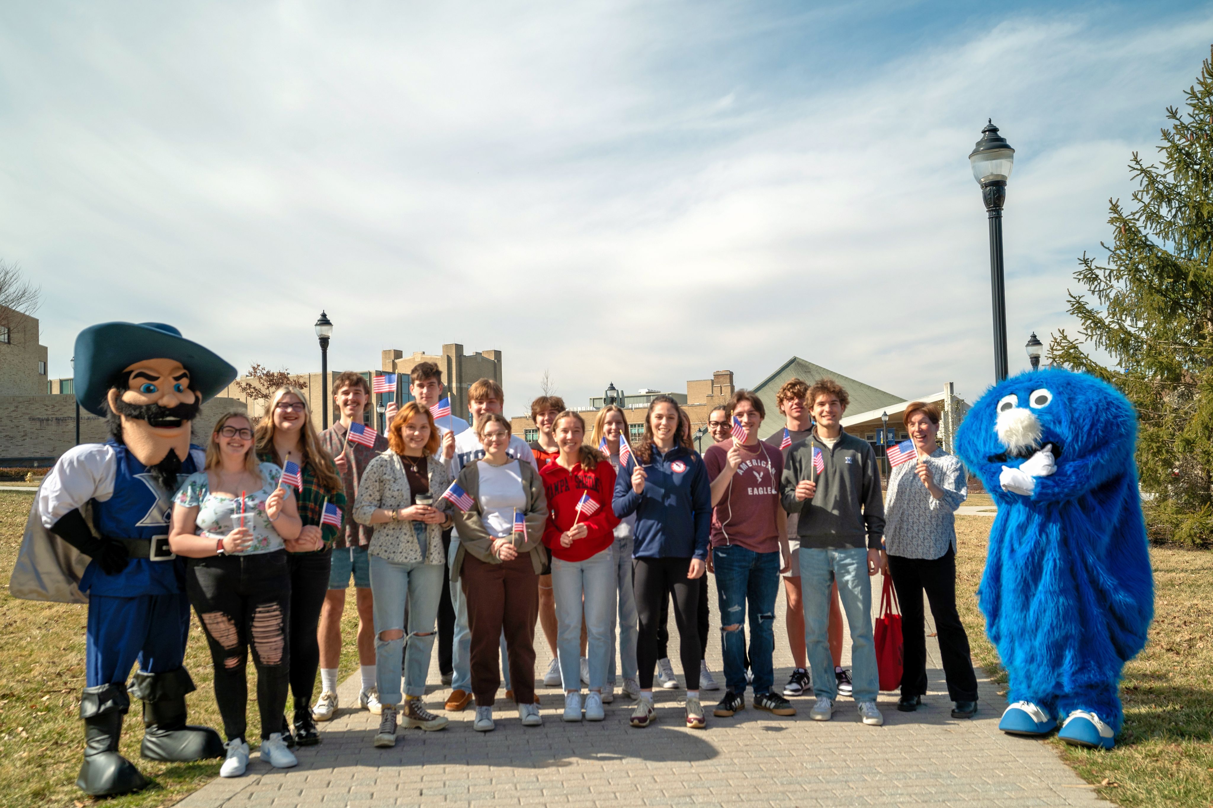 Piper Kelly, posing with Xavier students from the Exercise Science program.