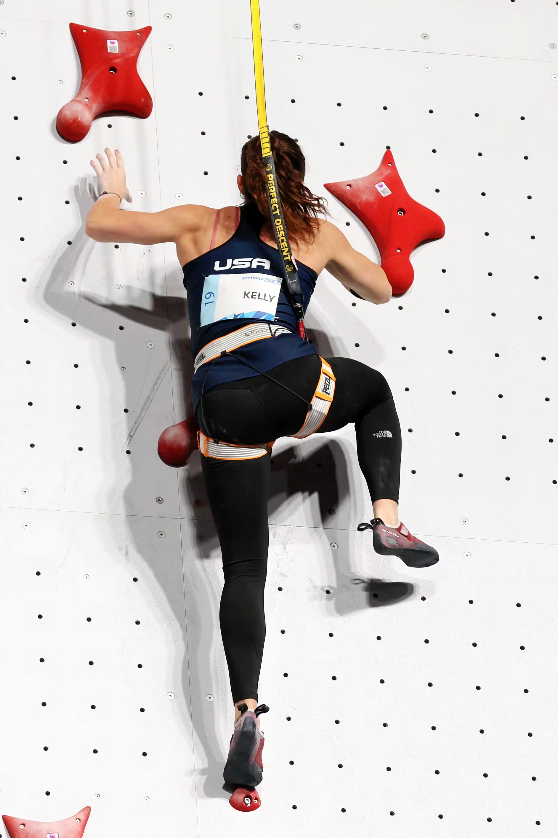 Piper Kelly climbing the wall in Santiago, Chile to qualify for Paris Olympics.