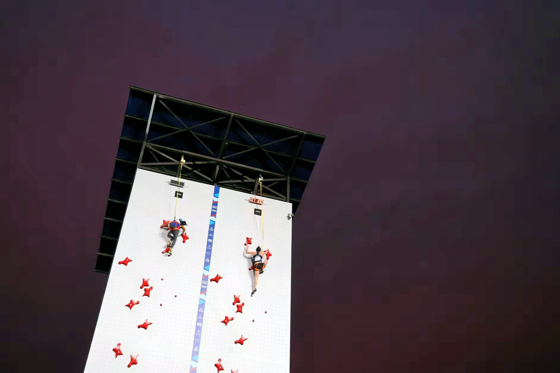 Piper Kelly climbing the wall in Santiago, Chile to qualify for Paris Olympics.