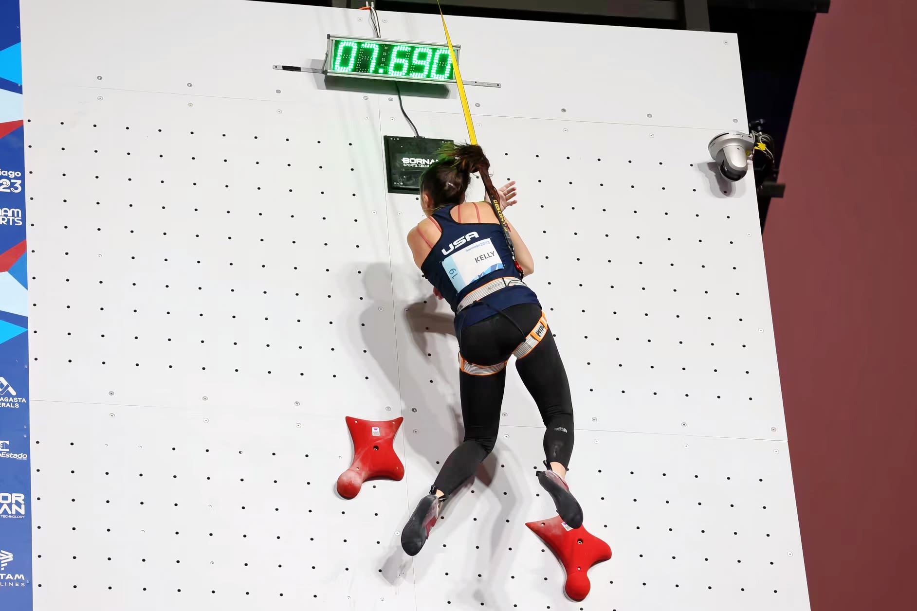 Piper Kelly climbing the wall in Santiago, Chile to qualify for Paris Olympics.